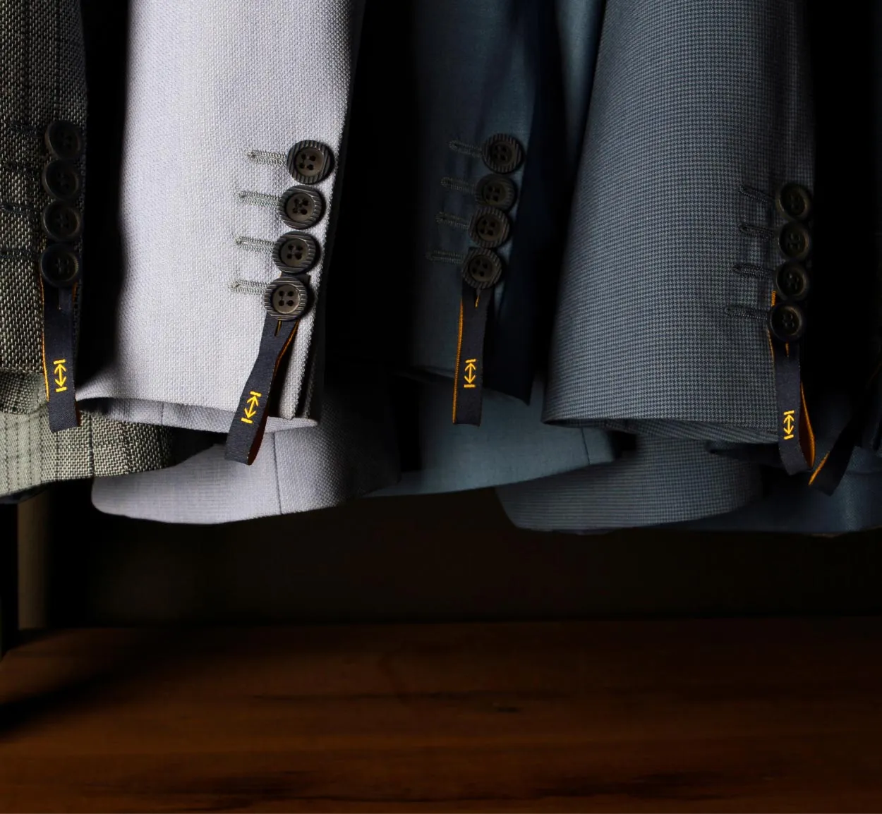 Knap Suits labels design on sleeves showcase